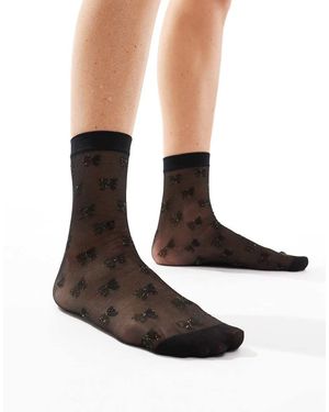 Pretty Polly Calcetines Negros Transparentes Con Patrón De Lazos Brillantes De - Blanco