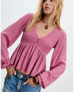 Stradivarius Blouse ample à manches longues - pâle - Rose