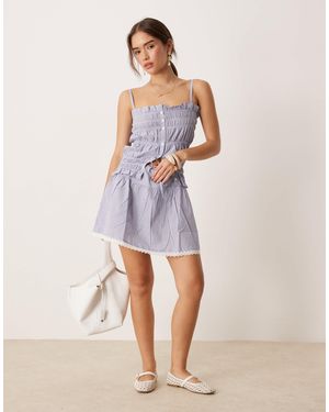 esmé studios Esmee Exclusive Tie Front Mini Beach Skirt With Trim Detail - Blue