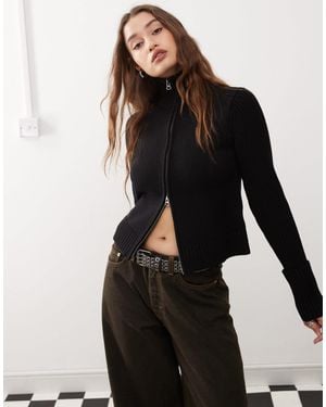 Weekday Winona - gilet zippé à col montant et poignets retroussés - Noir