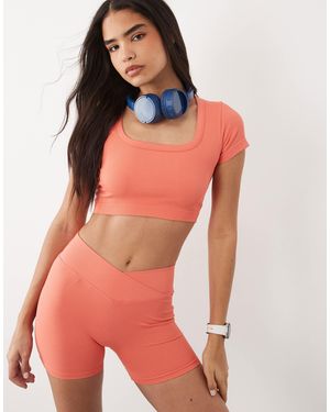 4505 T-shirt crop top côtelé effet rétréci sans coutures à encolure dégagée - corail - Rouge