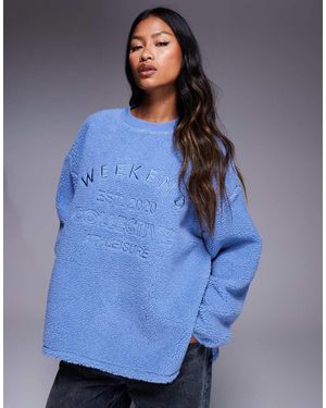 ASOS Weekend Collective Borg Sweatshirt With Embroidered Graphic - Blue