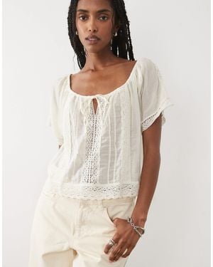 Mango Blouse à broderies - crème - Neutre