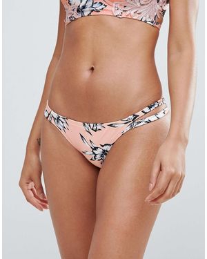 River Island – bedruckte bikinihose mit seitlichem riemchendesign und tiefem bund - Pink