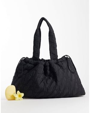 4505 Woven Logo Quilted Tote With Adjustable toggle - Black