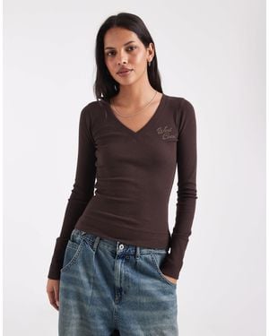 Hollister Grafisches langärmliges t-shirt mit v-ausschnitt - Blau