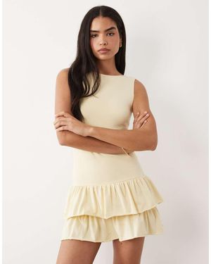 Fashionkilla Exclusive Cotton Rich Sleeveless Drop Waist Ruffle Hem Mini Dress - Natural