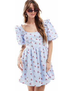 The Frolic Exclusive Seersucker Ruffle Puff Sleeve Shirred Babydoll Mini Dress - Blue