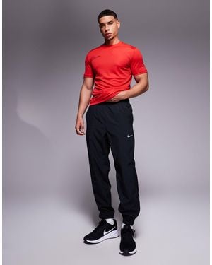 Nike – form dri-fit – tapered fit jogginghose - Schwarz