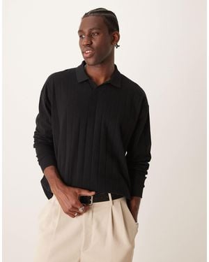 ASOS Polo oversize avec manches longues et col à revers - Noir