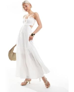The Frolic Exclusive Tie Front Ruffle Trim Open Back Tiered Maxi Dress - White