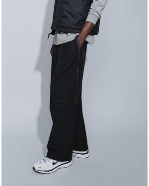 Nike Joggers Shori Tech Fleece De Pernera Ancha En - Negro