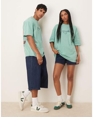 ASOS Disney Pixar Unisex Oversized T-shirt With Toy Story Prints - Green