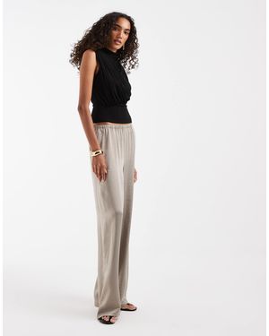 Vero Moda Pantalon large en satin texturé couleur pierre - Blanc