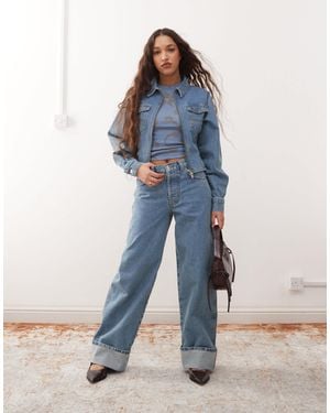 Collusion – weite, umgeschlagene jeans - Blau