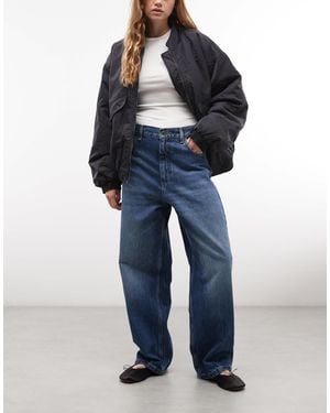 Carhartt Jean brandon baggy coupe ample droite délavage moyen - Bleu