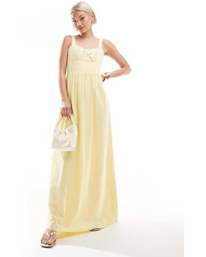 The Frolic Exclusive Sweetheart Contrast Ruffle Trim Bow Detail Maxi Dress - Metallic