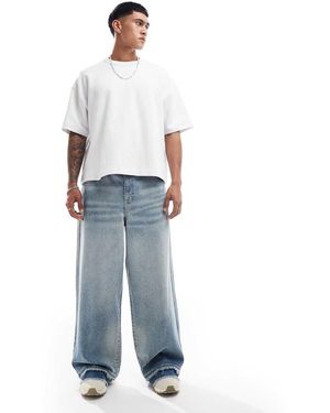 ASOS Vaqueros Muy Holgados Con Vintage Tintado Y Bajos Desflecados De - Azul