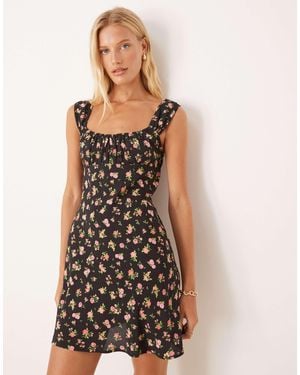 Mango – kurzes etuikleid mit eckigem ausschnitt und blumenmuster - Schwarz