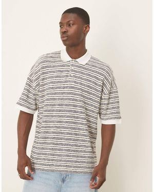 ASOS Polo oversize à rayures texturées et épaules tombantes - bleu/blanc - Multicolore