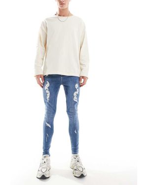 HERA Spray On Ripped Jean - Blue