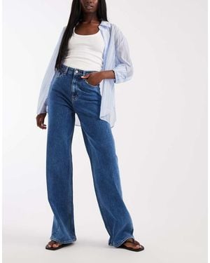 Tommy Hilfiger Vaqueros De Talle Alto Y Pernera Ancha Con Lavado Azul Medio Claire De