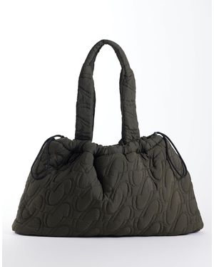 4505 Woven Logo Quilted Tote With Adjustable toggle - Black