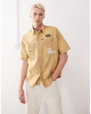 Aape By A Bathing Ape Aape by a bathing ape – kurzärmliges worker-hemd mit beige und stickerei hinten - Natur