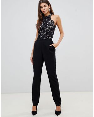 Morgan – Hoch geschlossener Tailored Fit Jumpsuit mit Spitzenoberteil, schwarz