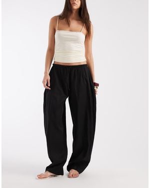 & Other Stories Pantalones Negros De Corte Globo Con Lazada En La Cintura