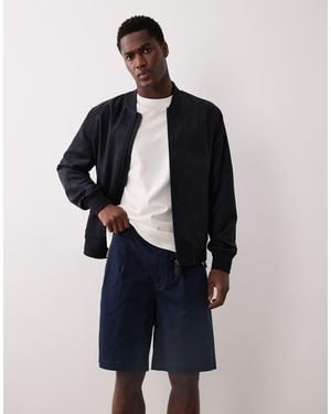 Calvin Klein 9" Pleated Chino Shorts - Blue