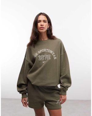 Nike Sudadera Varsity Oversize Studio Fleece En-Verde - Marrón