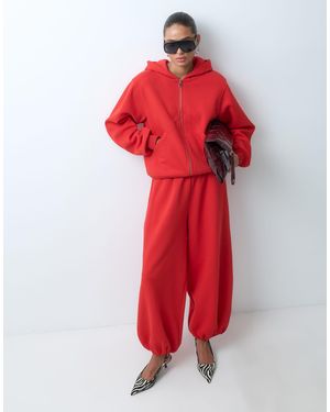 ASOS Jogger mit umgeschlagenem saum und ballonschnitt - Rot