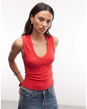Collusion Camiseta Roja Sin Mangas Con Escote De Pico Y Costuras A La Vista De Canalé - Rojo