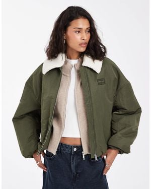 Tommy Hilfiger Veste style utilitaire avec col en fausse fourrure - kaki - Vert