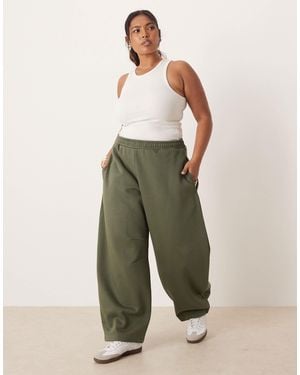ASOS Asos Design Curve Barrel Leg Brushback Trackies - Green