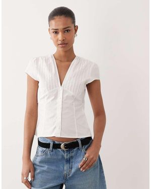Gina Tricot Blusa Blanca De Manga Corta Con Cuello De Pico De Tejido Rico En Algodón De - Blanco