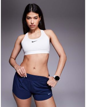Nike Sujetador Deportivo Pálido De Sujeción Media Con Logo Dri-Fit De - Blanco
