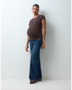 Mama.licious Mamalicious umstandsjeans mit weitem bein und bund über dem bauch - Blau