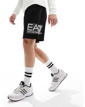 EA7 Pantalones Cortos De Chándal Negros Con Logo Lateral Grande De Armani - Blanco