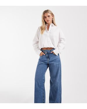 Only Petite Hope Mid Rise Wide Leg Jeans With Button Detail - Blue