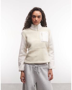 The North Face Yumiori zip 1/4 en stone et blanc