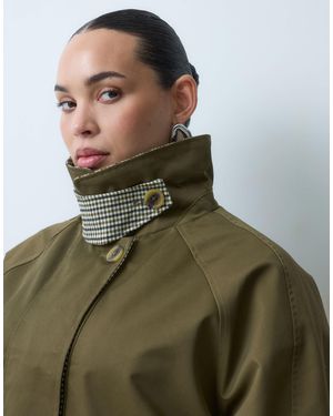 ASOS Asos design curve trenchcoat mit cape-detail und kariertem futter - Grün
