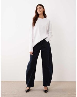 ARRANGE Tova Barrel Tapered Curved Leg Jean With Roll Hem - White