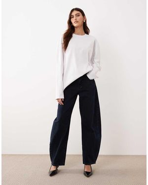 ARRANGE Vaqueros Tapered Negro Azulado Con Pernera Curvada Y Bajos Con Vuelta Tova De -Azul Marino - Blanco