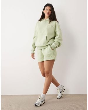 Kaiia Studio Embossed Logo Mini Shorts - Green