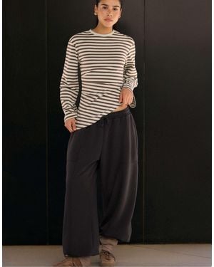 Stradivarius Asymmetrisches gestreiftes langarm-t-shirt - Schwarz