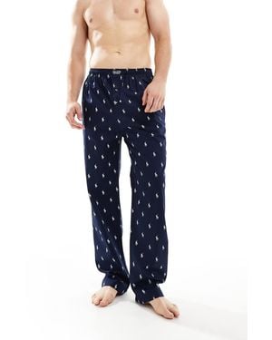 Polo Ralph Lauren Lounge Trousers With All Over Logo - Blue