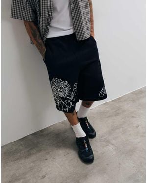 TRUE RELIGION Tiger Graphic Script Loose Fit Fleece Shorts - Black