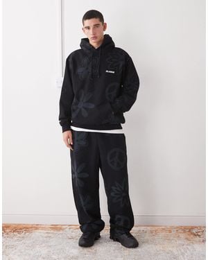 X-Large Peace Print Logo Cuffed sweatpants Co-ord - Black